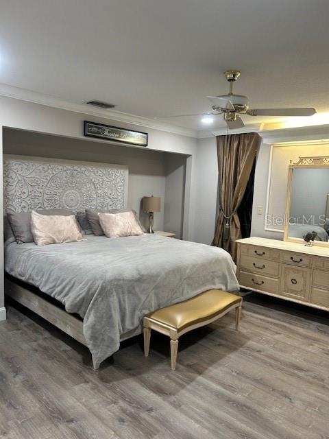 35 Pinewinds Boulevard Oldsmar, FL 34677 - Photo 22 of 36 a bedroom with a bed and a large window