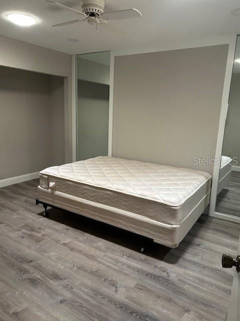 35 Pinewinds Boulevard Oldsmar, FL 34677 - Photo 30 of 36 a bedroom with a bed and a table