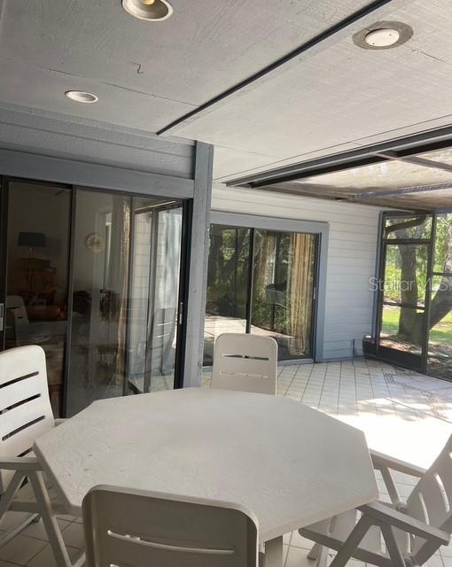 35 Pinewinds Boulevard Oldsmar, FL 34677 - Photo 35 of 36 a bedroom with a large bed and a large window