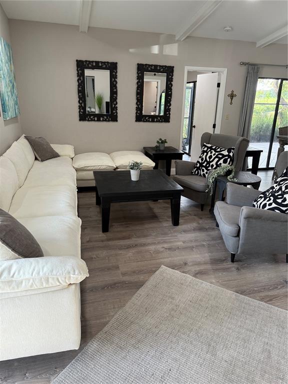 35 Pinewinds Boulevard Oldsmar, FL 34677 - Photo 9 of 36 a living room with furniture and a couch