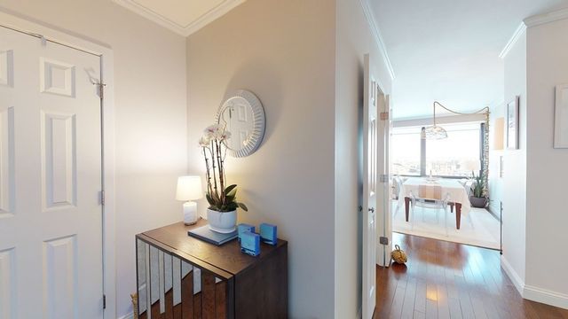 a view of a livingroom with furniture and wooden floor