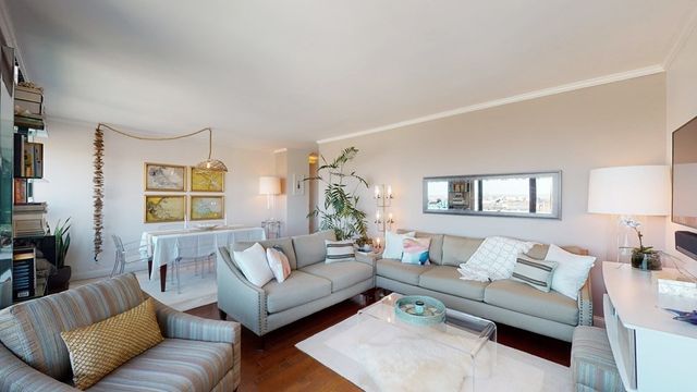 a living room with furniture and a couch