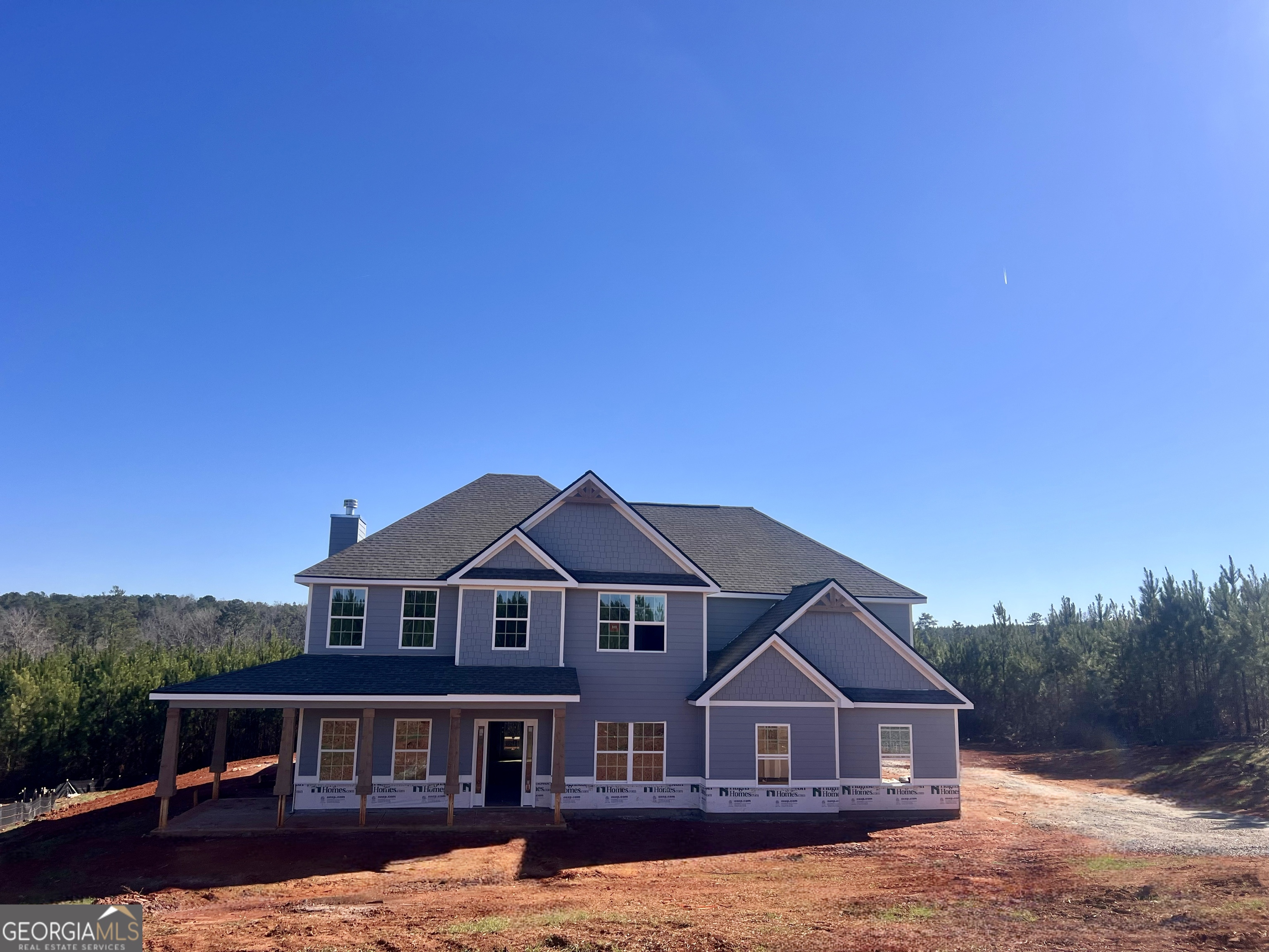 98 Hawkeye Trail, Unit 84 Fortson, GA 31808 - Photo 2 of 42 a front view of a house with a yard