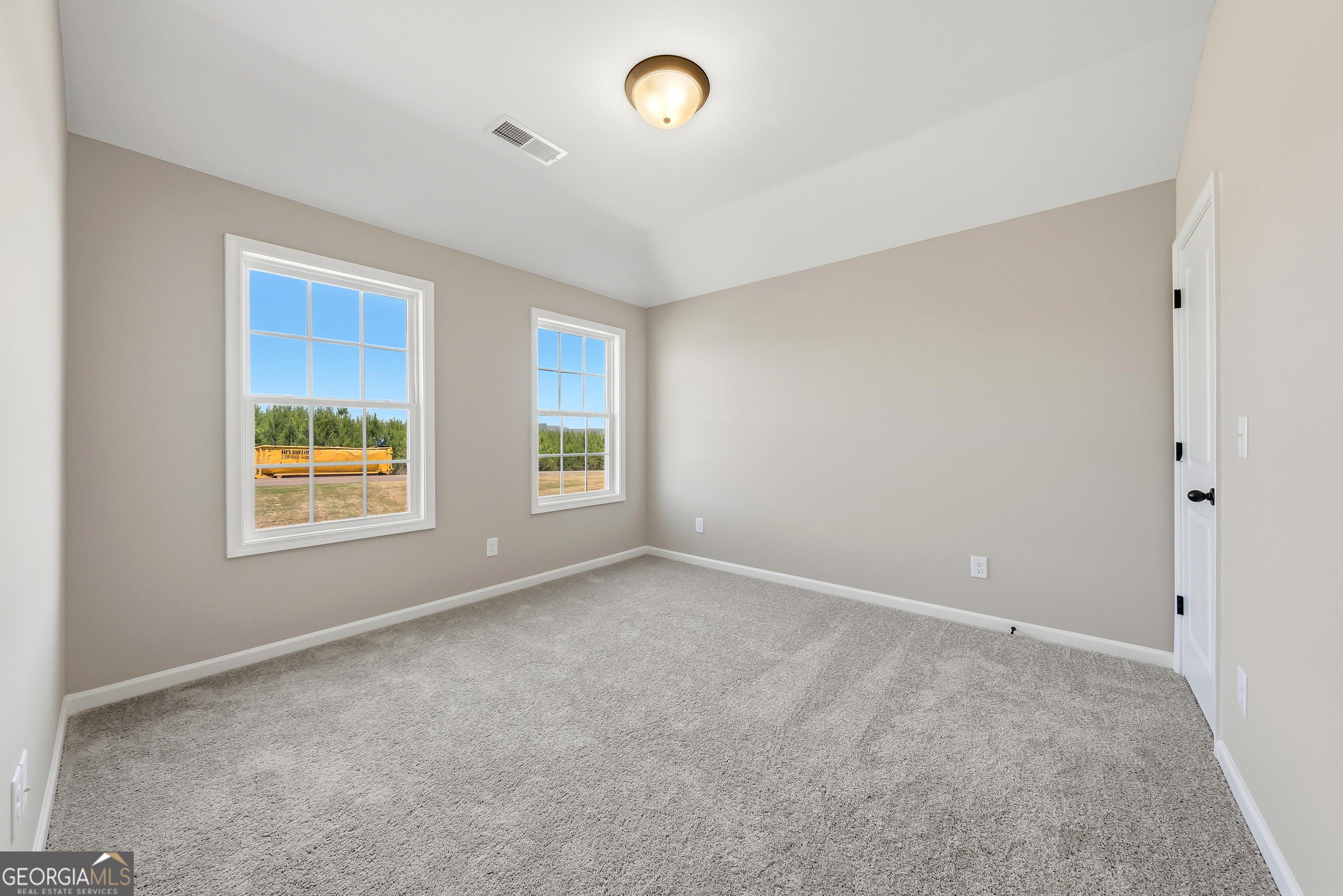 98 Hawkeye Trail, Unit 84 Fortson, GA 31808 - Photo 22 of 42 a view of an empty room with a window