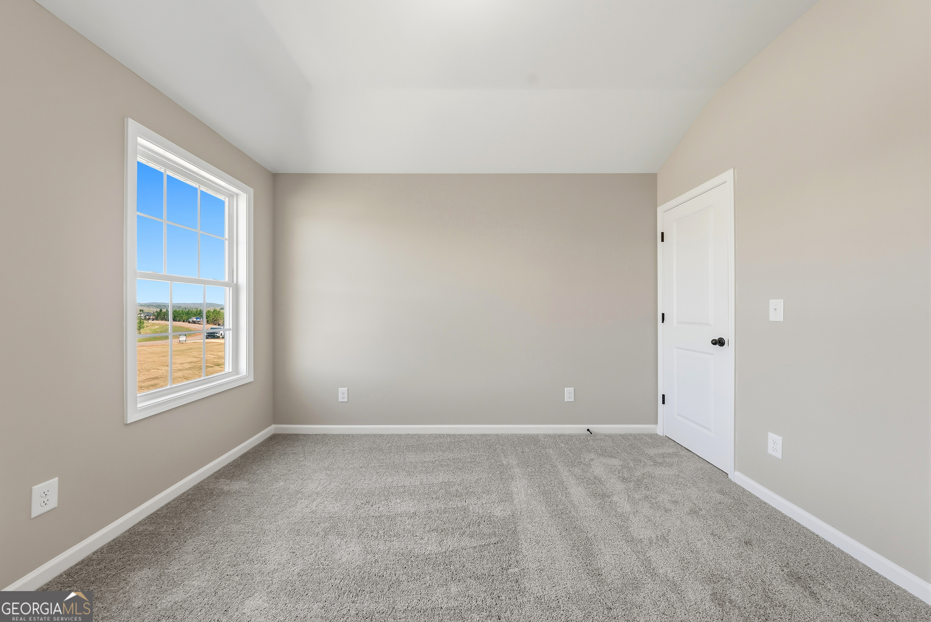98 Hawkeye Trail, Unit 84 Fortson, GA 31808 - Photo 23 of 42 an empty room with windows