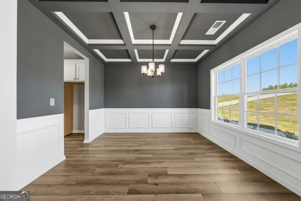a view of a livingroom with a staircase