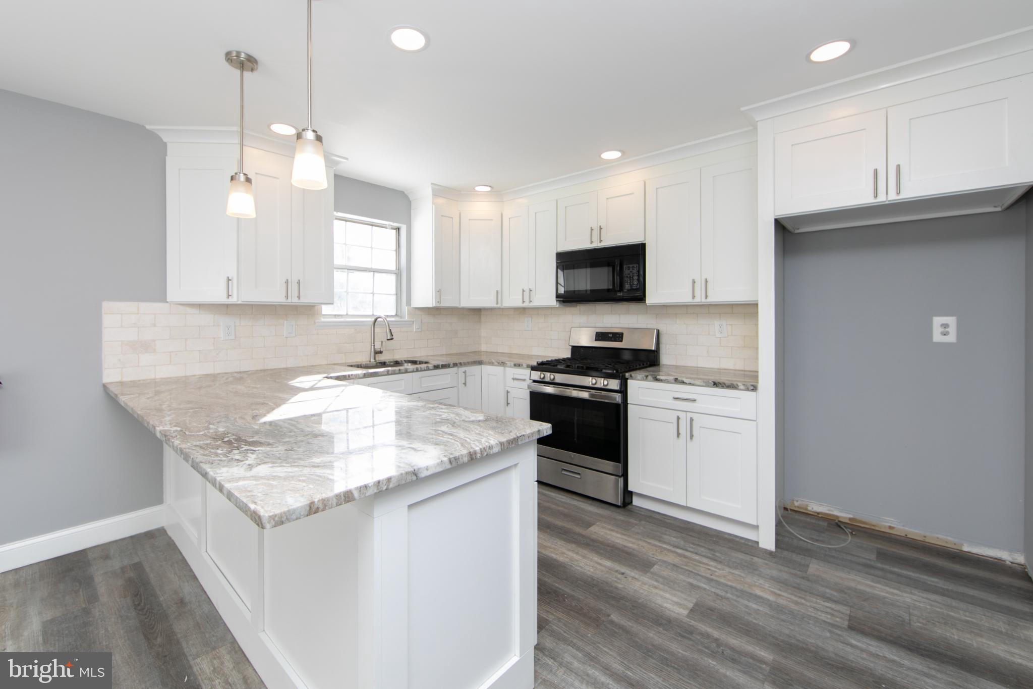 131 Crossing Way Lindenwold, NJ 08021 - Photo 9 of 34 Modern kitchen with sleek finishes.