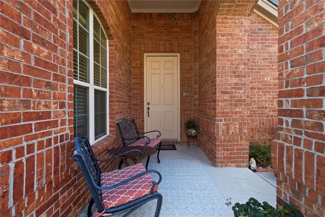 a view of a outdoor seating area with furniture