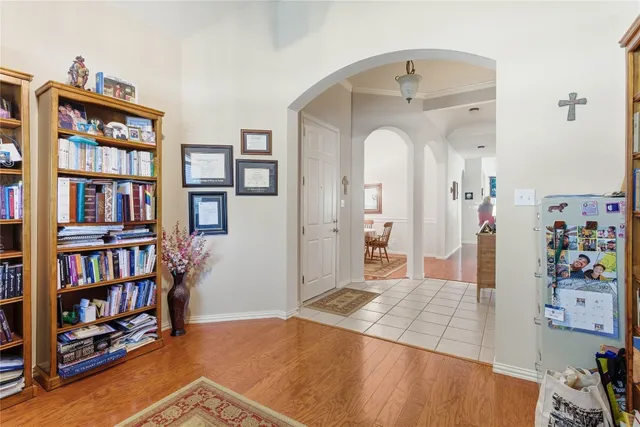 a view of a bedroom with cabinet and shelf