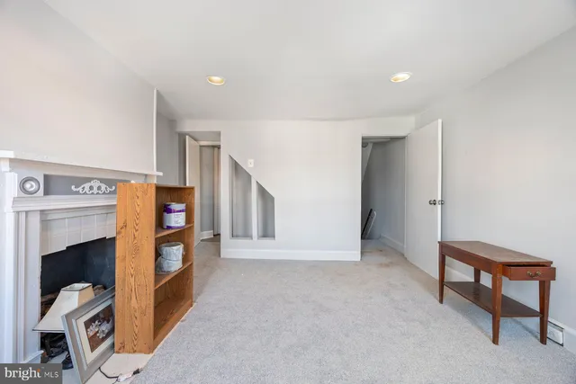 a utility room with cabinets washer and dryer