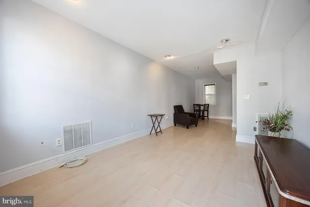 a room with furniture and a chair