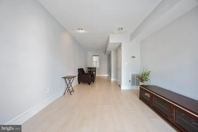 a room with furniture and a chandelier