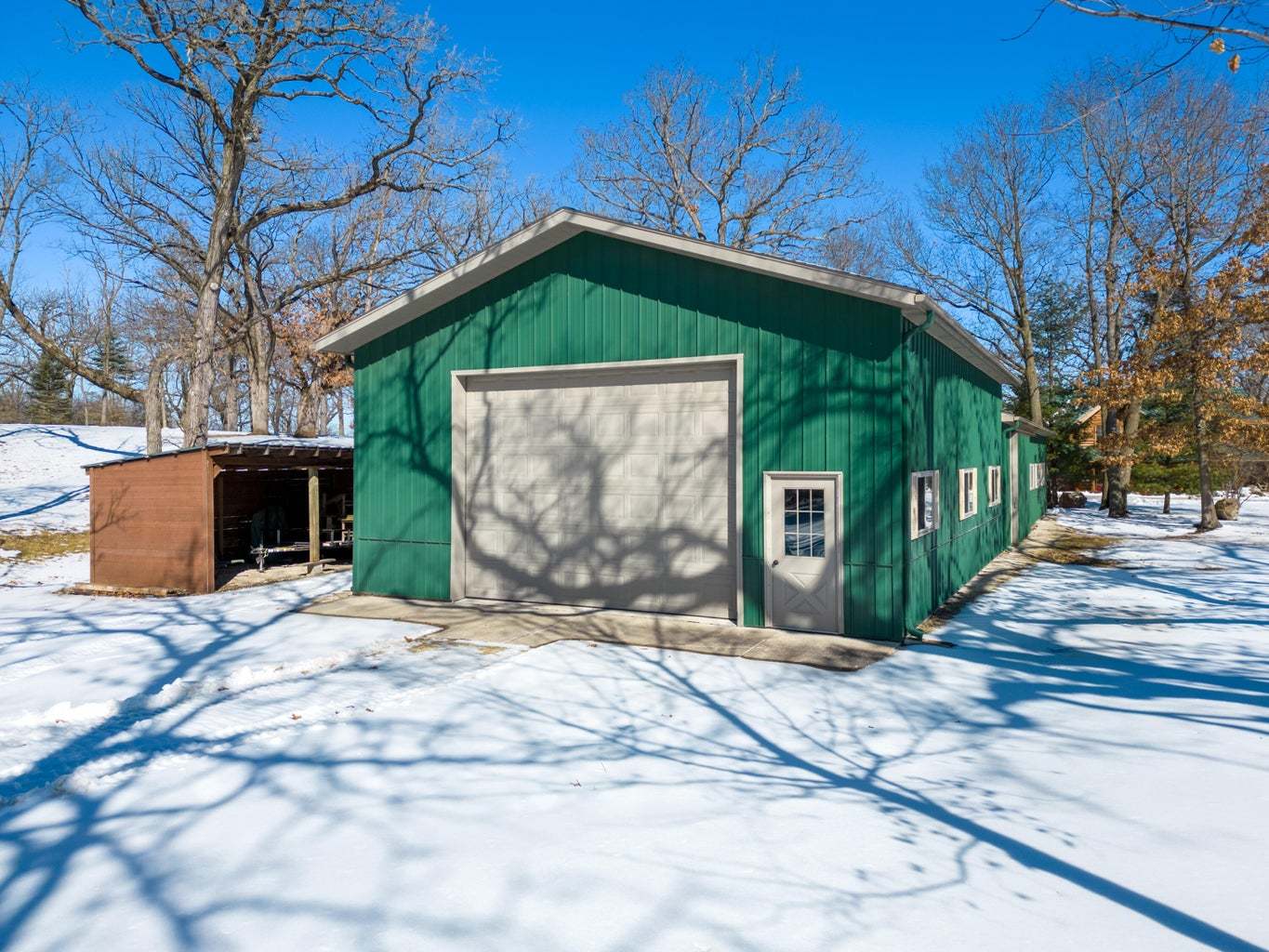 4901 Maple Road East Troy, WI 53120 - Photo 16 of 34 a front view of a house with a yard