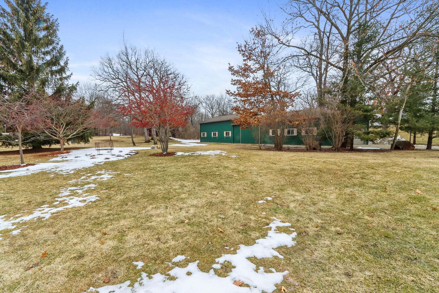 4901 Maple Road East Troy, WI 53120 - Photo 19 of 34 a swimming pool with trees in the background