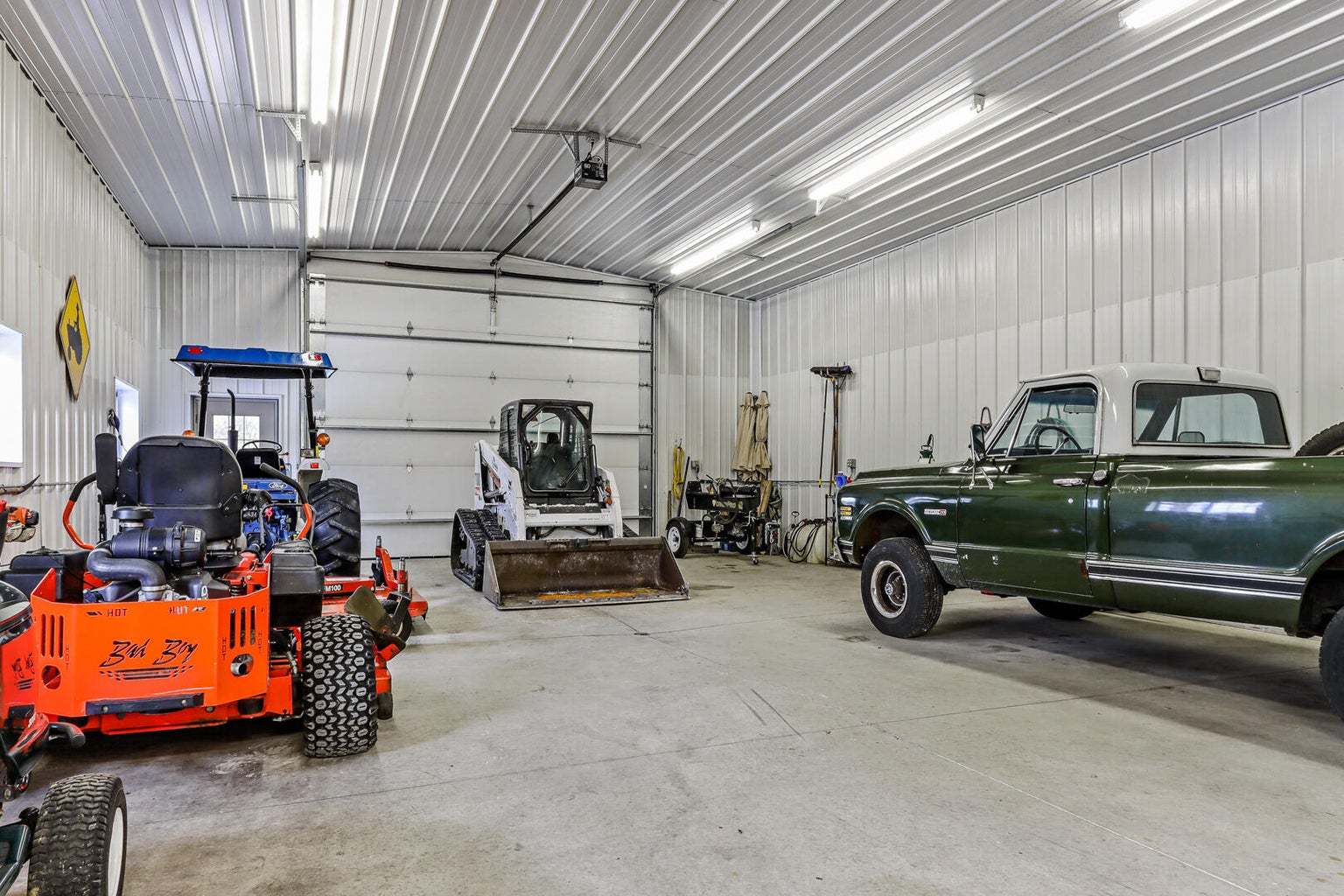4901 Maple Road East Troy, WI 53120 - Photo 21 of 34 a view of a garage with a table and a chairs