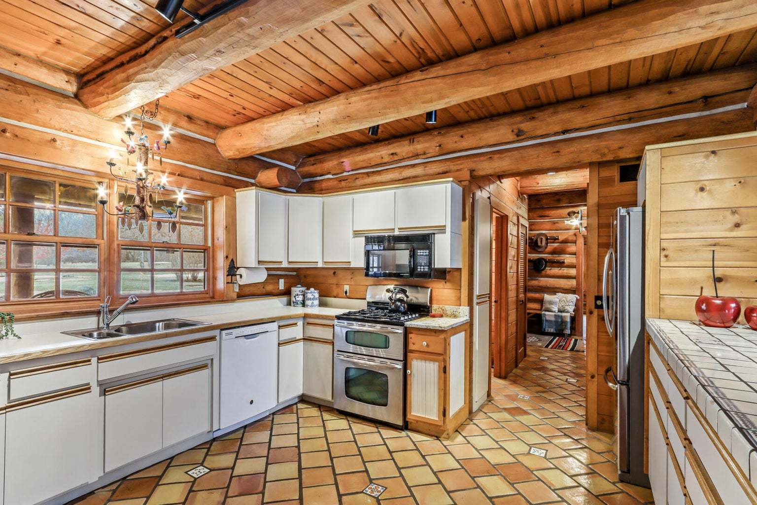 4901 Maple Road East Troy, WI 53120 - Photo 27 of 34 a kitchen with a sink stove and cabinets