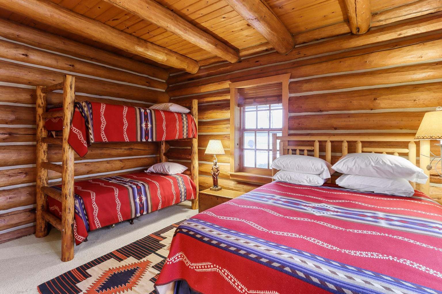 4901 Maple Road East Troy, WI 53120 - Photo 30 of 34 a bedroom with two beds and a walk in closet