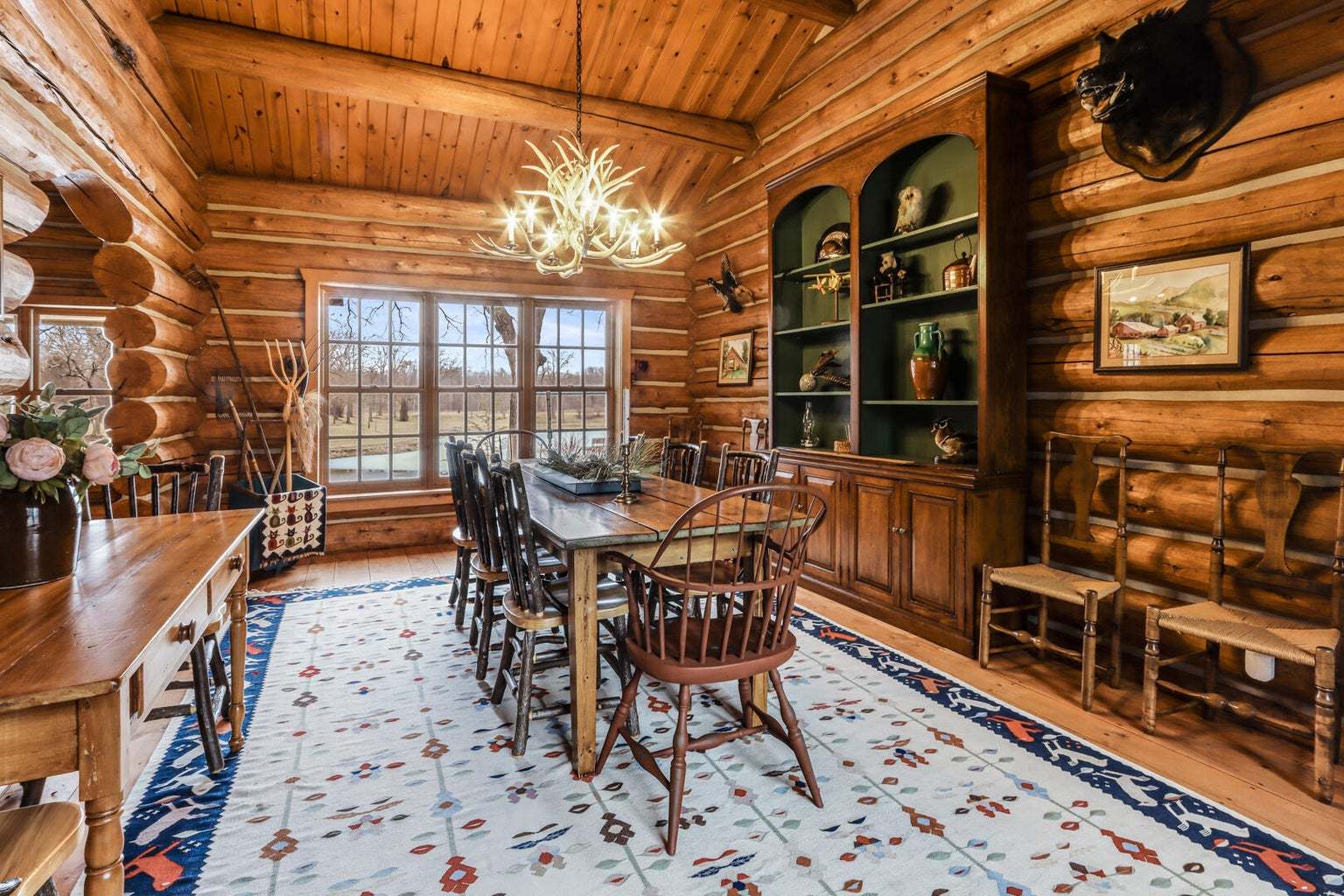 4901 Maple Road East Troy, WI 53120 - Photo 6 of 34 a view of a dining room with furniture and chandelier