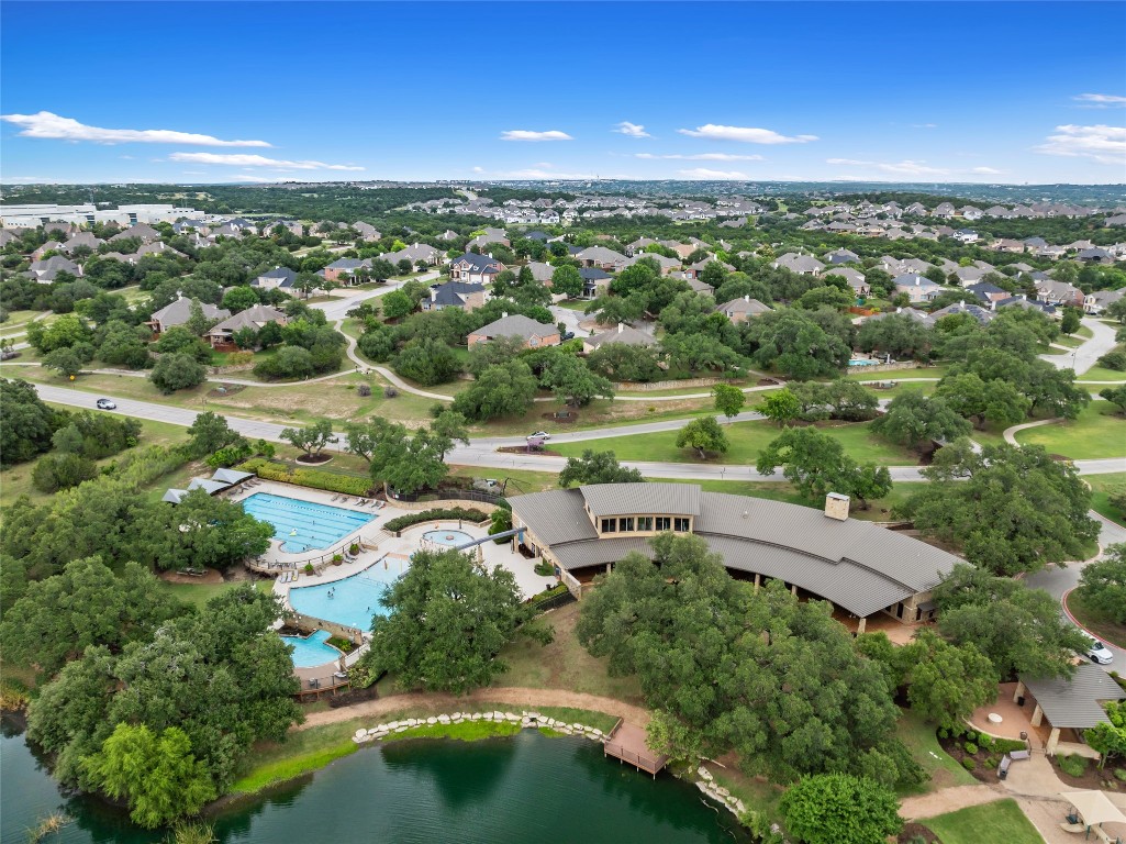 399 Whispering Wind Way Austin, TX 78737 - Photo 39 of 40 Aerial overview of property's location with a large body of water and a pool