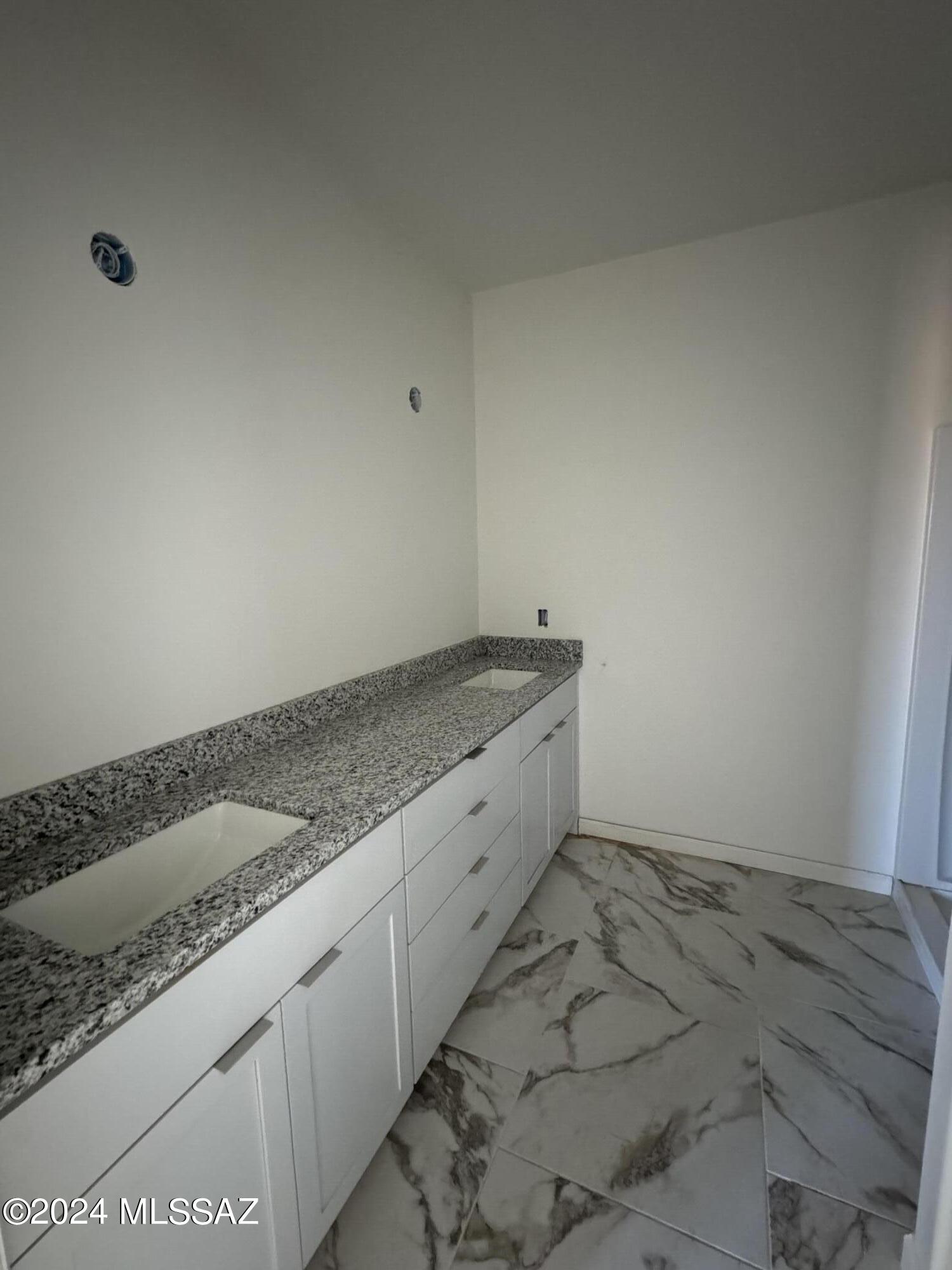 1643 Bala Court Rio Rico, AZ 85648 - Photo 5 of 18 a room with a sink