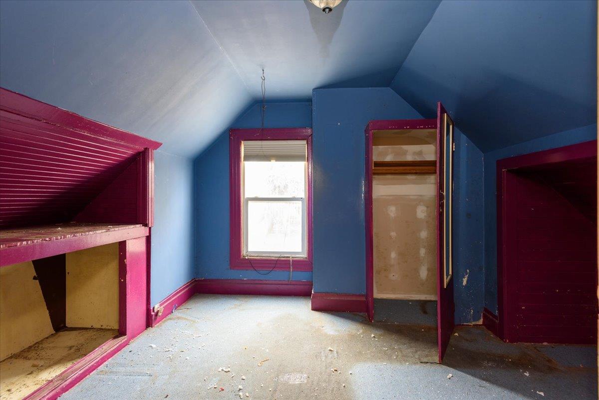 108 Cortland Avenue San Francisco, CA 94110 - Photo 11 of 27 an empty room with windows