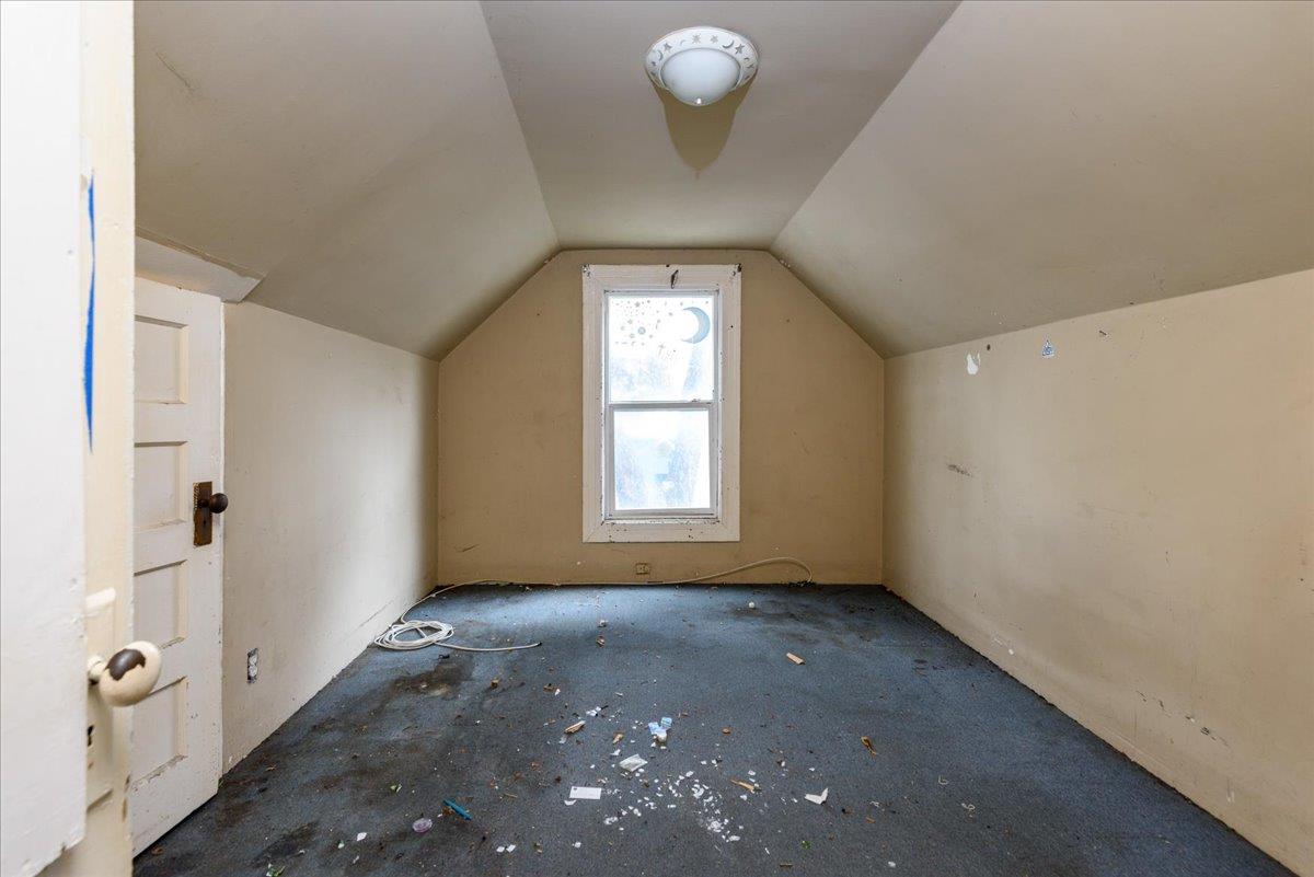 108 Cortland Avenue San Francisco, CA 94110 - Photo 12 of 27 a view of an empty room with a window