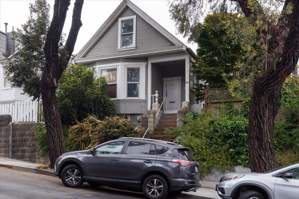 108 Cortland Avenue San Francisco, CA 94110 - Photo 2 of 27 a view of a car parked in front of a house