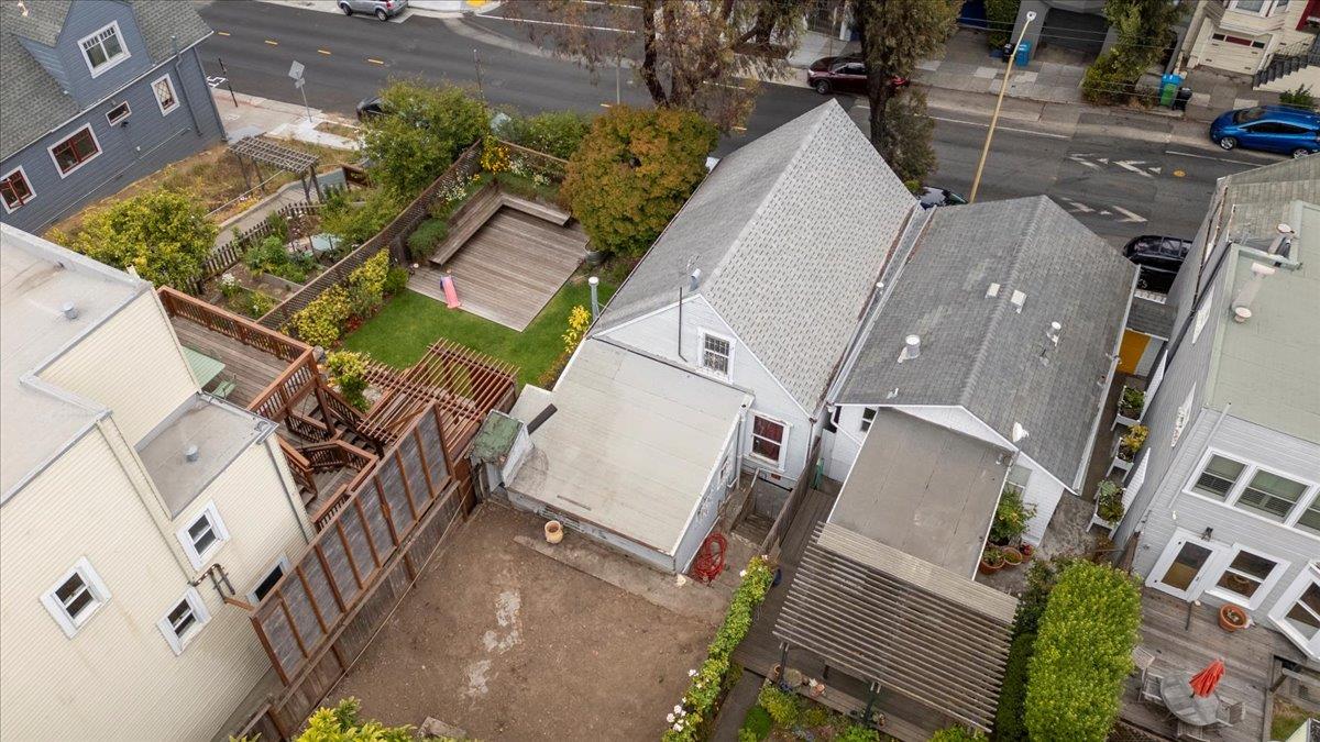 108 Cortland Avenue San Francisco, CA 94110 - Photo 21 of 27 an aerial view of a house with a yard