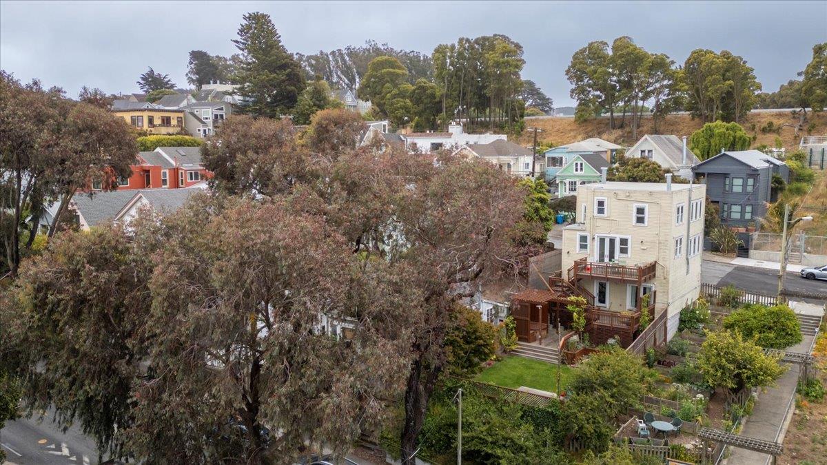108 Cortland Avenue San Francisco, CA 94110 - Photo 26 of 27 a view of a city with sign board