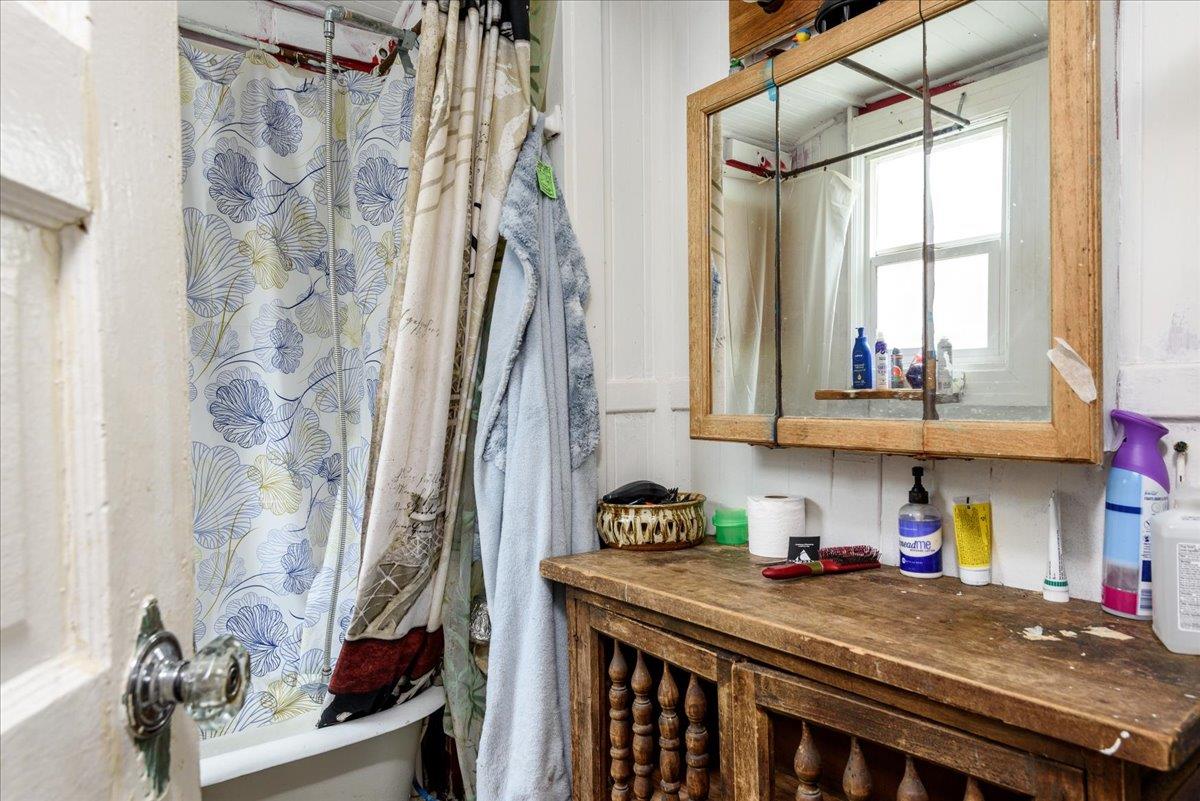 108 Cortland Avenue San Francisco, CA 94110 - Photo 9 of 27 a view of a dining table and chairs