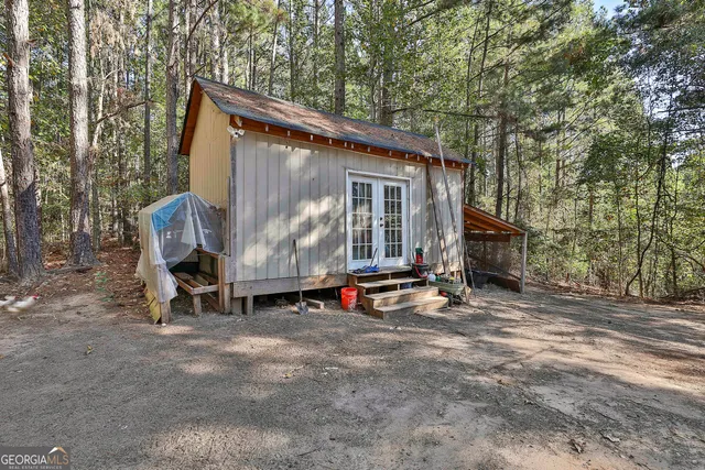 a view of outdoor space with playground and tree