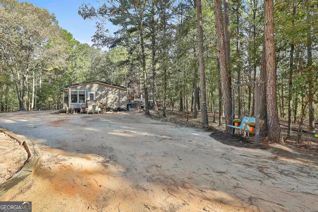 a view of a parked cars in front of a house
