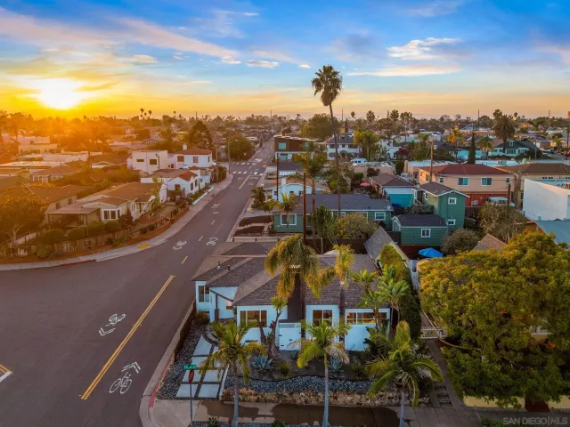 an aerial view of a house with a garden