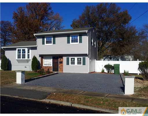 3 Monaghan Road Edison, NJ 08817 - Photo 1 of 16 a view of a house with a patio