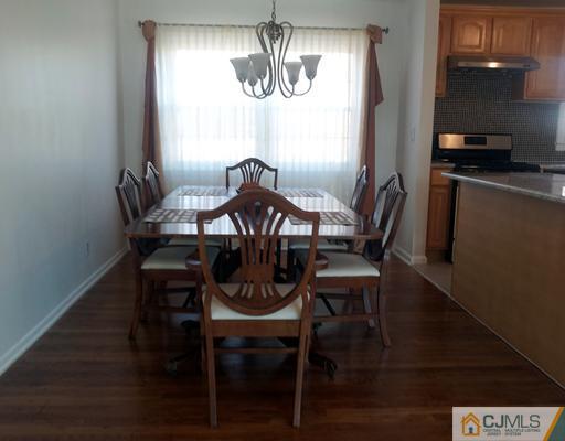 3 Monaghan Road Edison, NJ 08817 - Photo 3 of 16 a view of a dining room with furniture and window