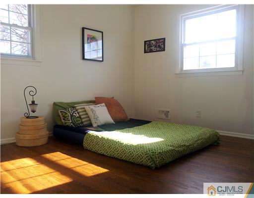 3 Monaghan Road Edison, NJ 08817 - Photo 9 of 16 a bedroom with a bed and a window