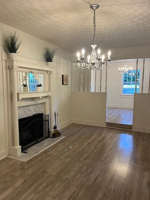1386 Chisholm Road Cypress Inn, TN 38452 - Photo 32 of 58 a view of a livingroom with a fireplace wooden floor and windows