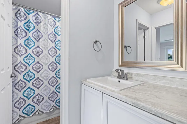 a bathroom with a bathtub and shower