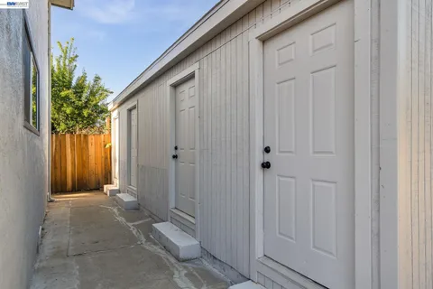 a view of a house with backyard space