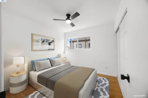 a bedroom with bed and a window