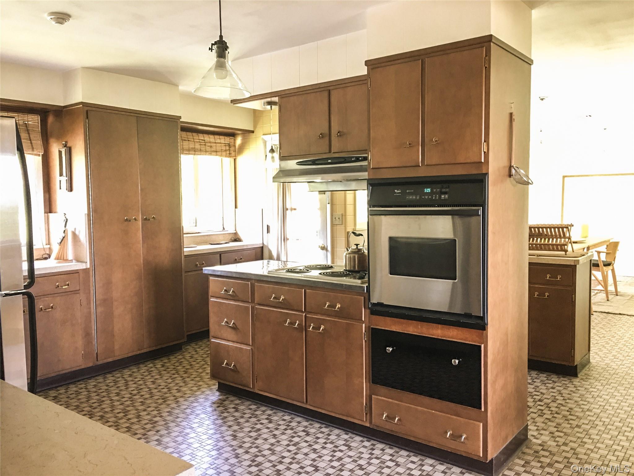 68-78 Ridge Road Clinton Corners, NY 12514 - Photo 16 of 50 a kitchen with stainless steel appliances granite countertop a refrigerator and a stove top oven