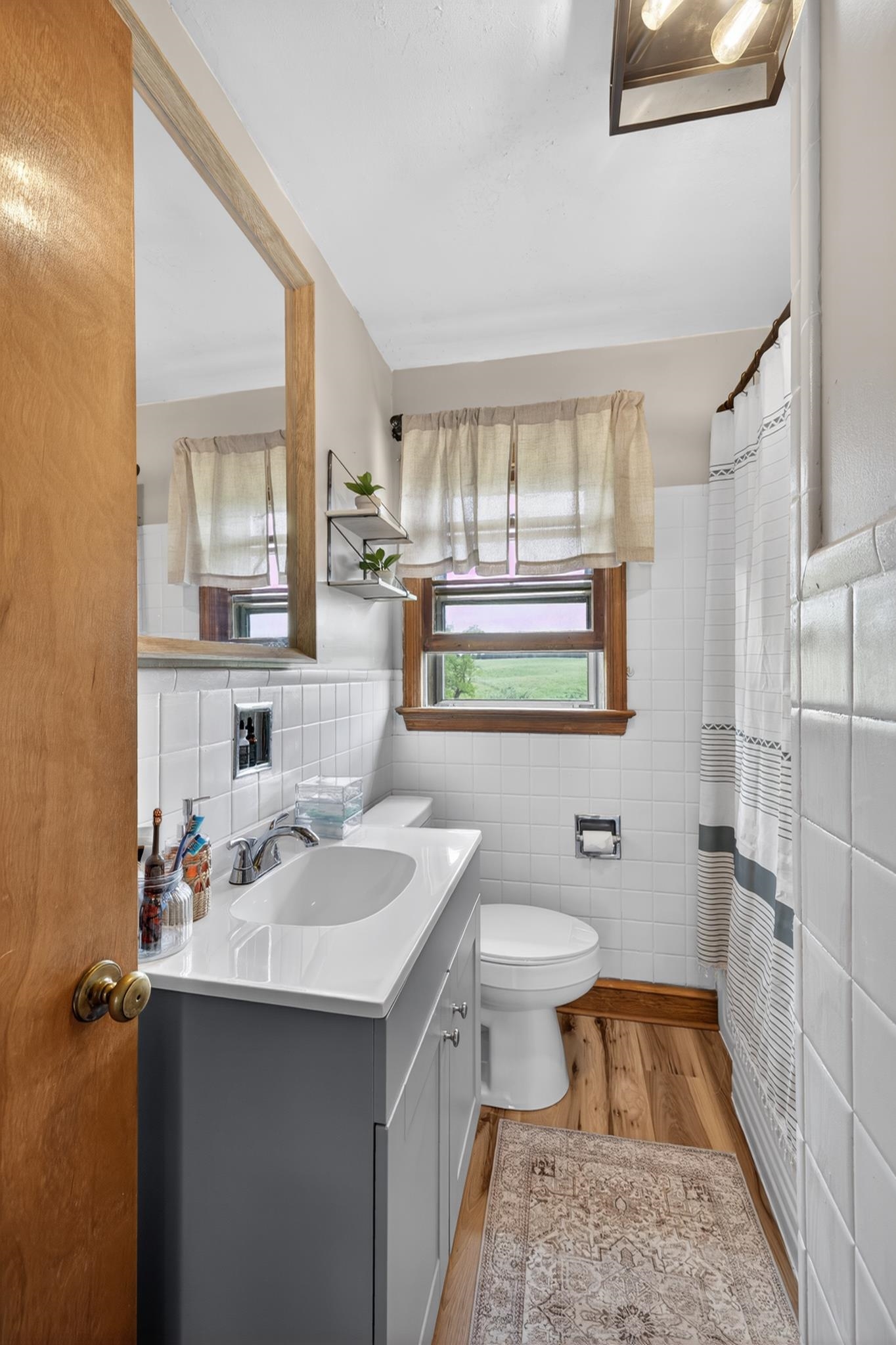 7827 Lee Highway Raphine, VA 24472 - Photo 31 of 62 a bathroom with a sink toilet and shower