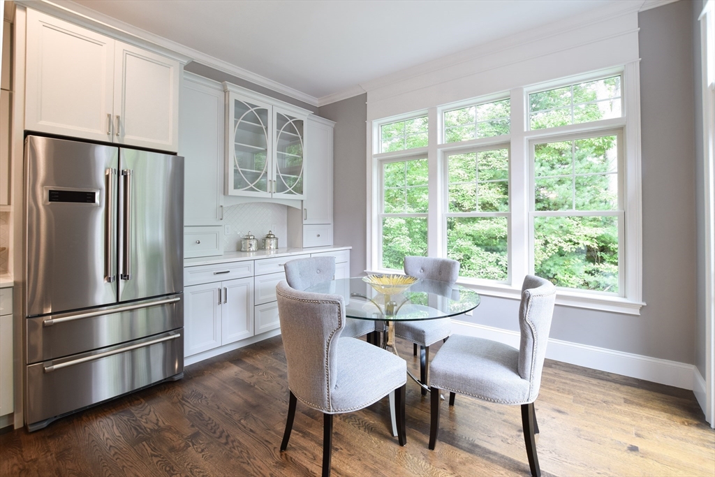 0 Diesel Lot-3 Lincoln, RI 02865 - Photo 6 of 10 a kitchen with stainless steel appliances granite countertop a refrigerator a sink a stove a dining table and chairs