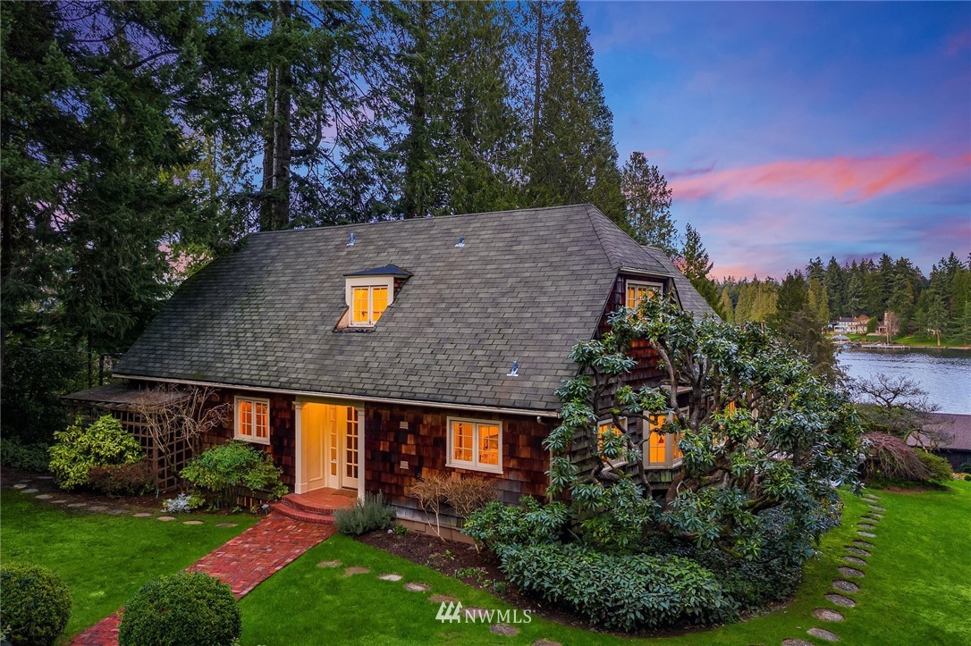 3430 Evergreen Point Road Medina, WA 98039 - Photo 2 of 11 a aerial view of house with yard and outdoor seating