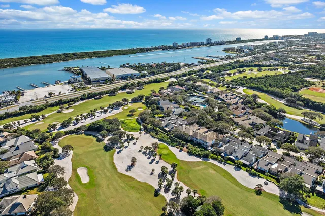 an aerial view of a house with a garden