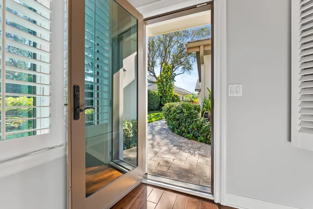 a view of a glass door and porch