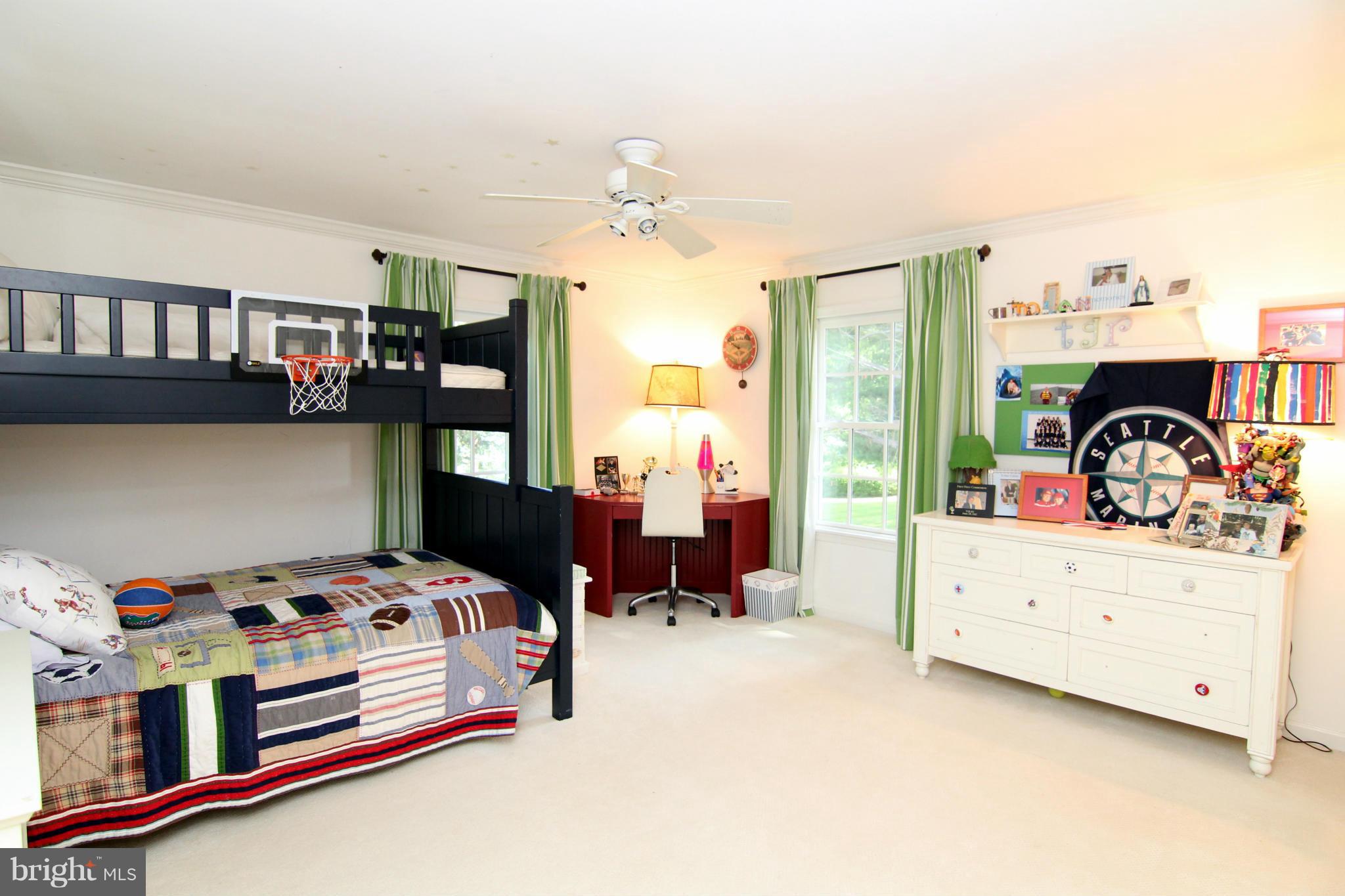 1001 Riva Ridge Drive Great Falls, VA 22066 - Photo 14 of 23 a bedroom with furniture and a baby crib