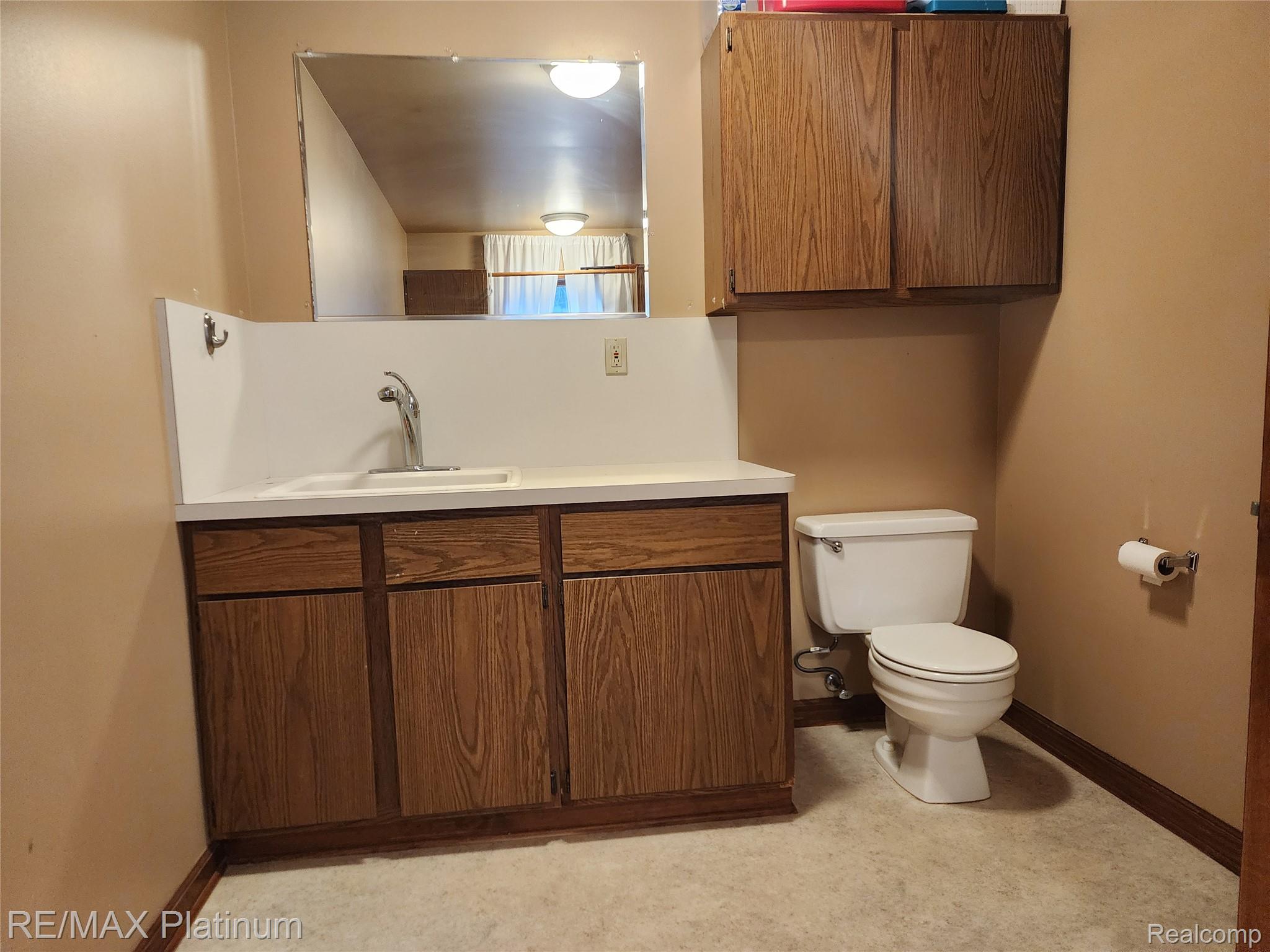 6451 Bullard Road Fenton, MI 48430 - Photo 17 of 26 Half bath in Laundry room