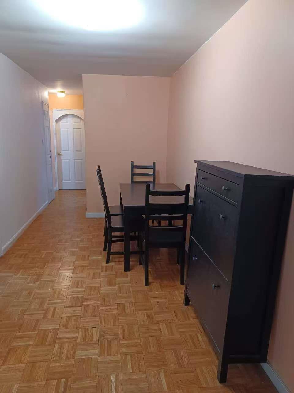 9431 60th Avenue, Unit 1G Queens, NY 11373 - Photo 4 of 7 Dining space featuring light parquet floors