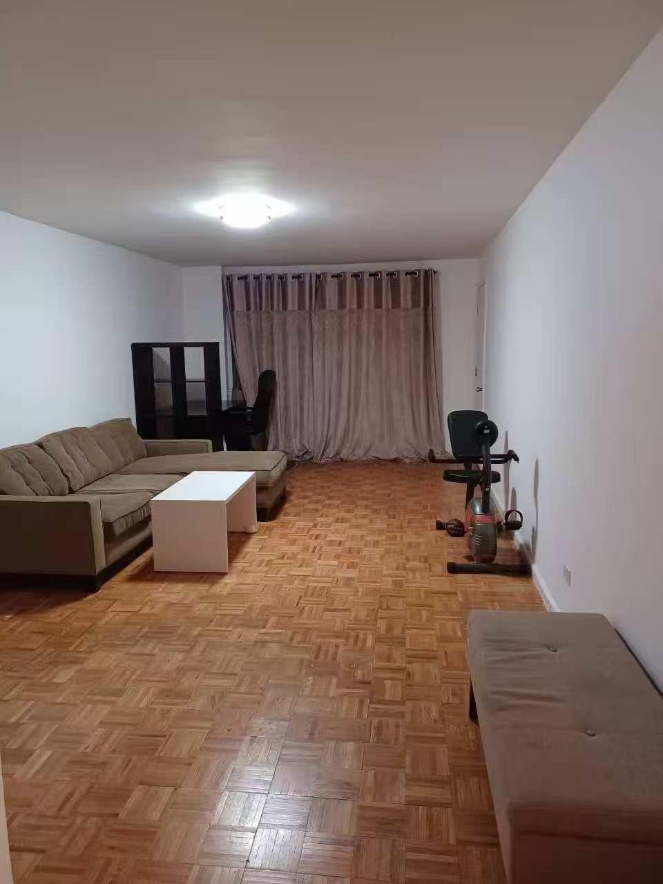 9431 60th Avenue, Unit 1G Queens, NY 11373 - Photo 5 of 7 Living room with light parquet floors